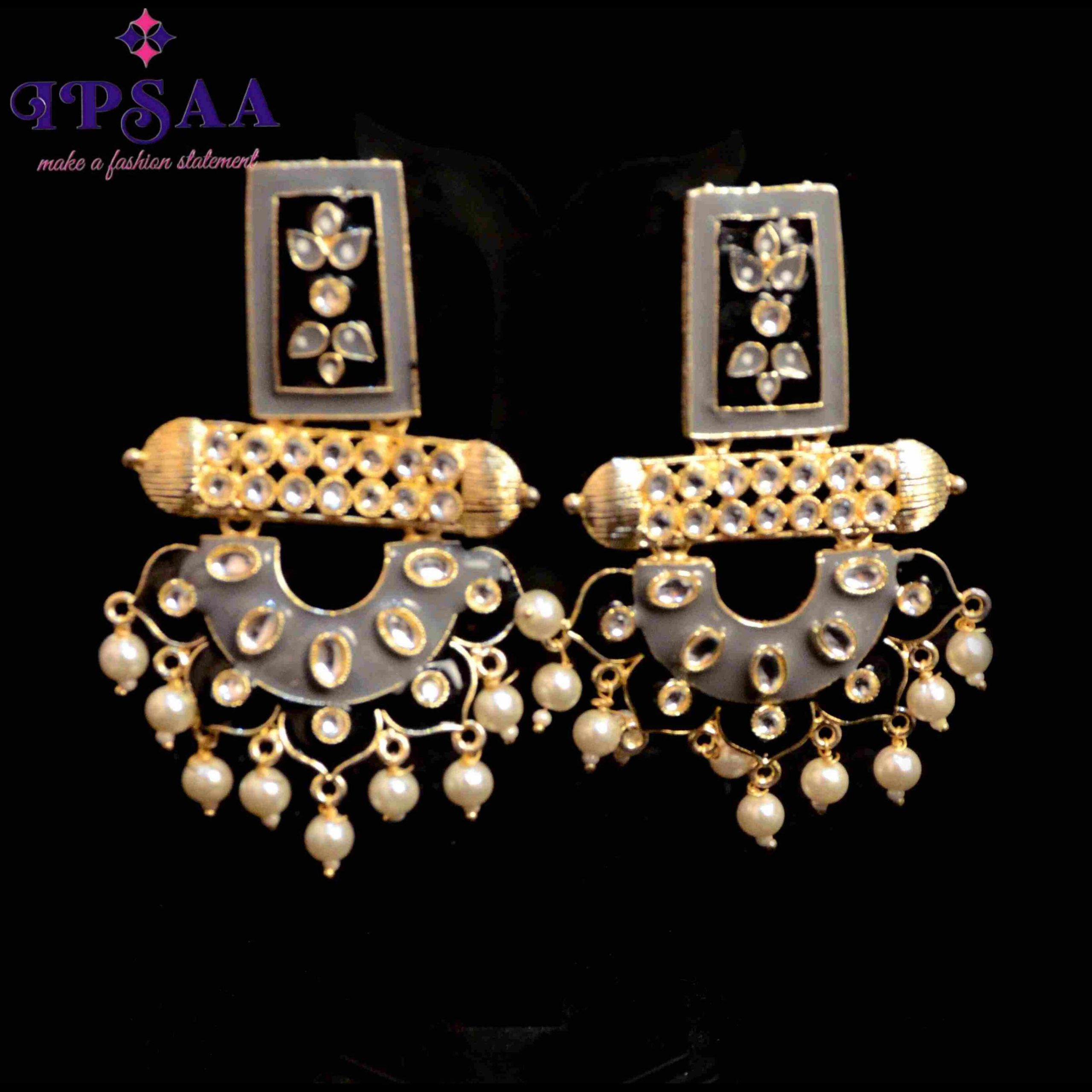 The classic and flair that this ethnic earrings possess is no ordinary, it has a gorgeous geometric drop and intricate minakari work.